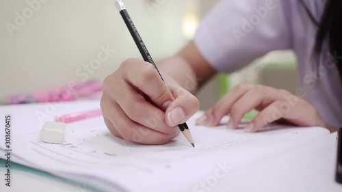 woman writing on paper