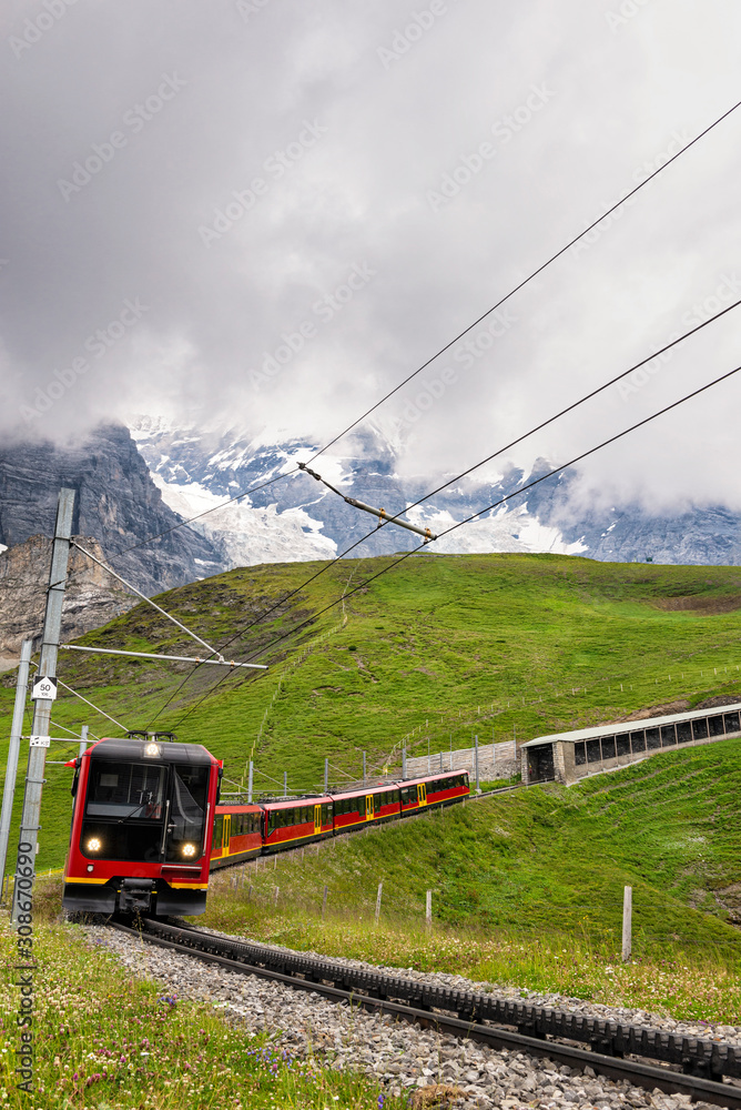 Swiss Mountain Train Returning to Station