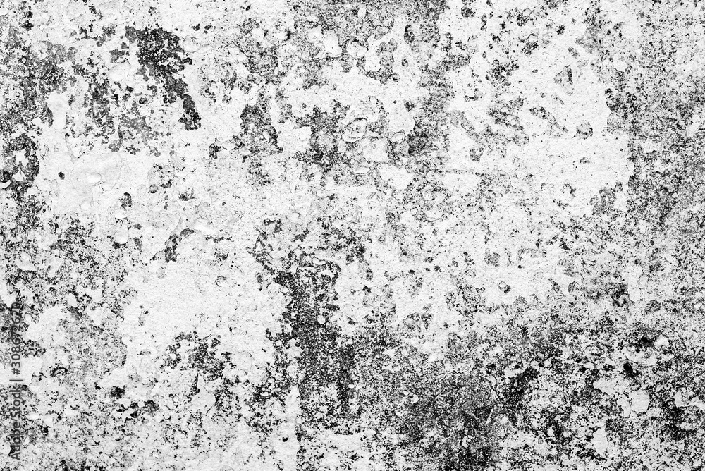 Texture of a concrete wall with cracks and scratches which can be used as a background Texture of a concrete wall with cracks and scratches which can be used as a background