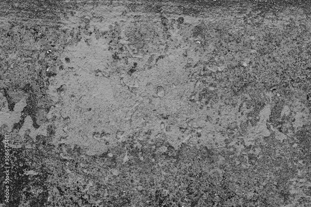 Fototapeta premium Texture of a concrete wall with cracks and scratches which can be used as a background