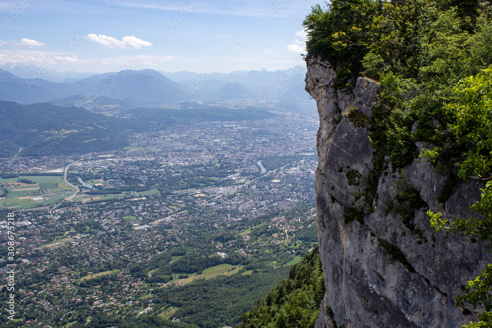 Obraz premium Aerial view of the city of Grenoble from the top of a cliff