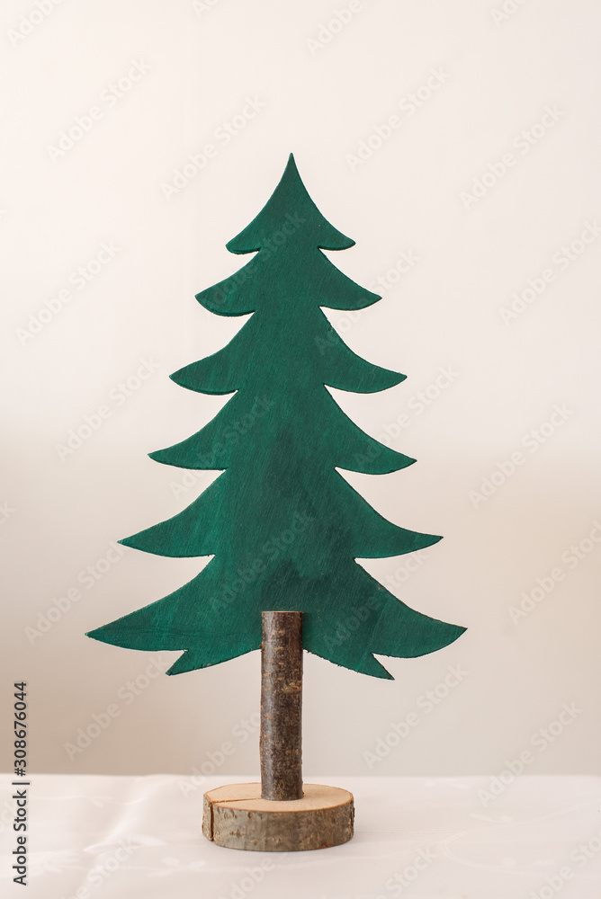 Tannenbaum aus Holz mit Baumstamm auf Baumscheibe Stock Photo Adobe Stock