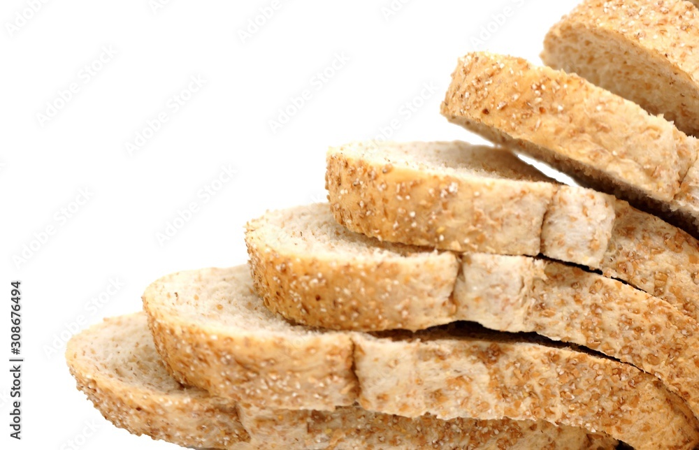 Close up image of cut of loaf whole grain bread isolated on white background Close up image of cut of loaf whole grain bread isolated on white background