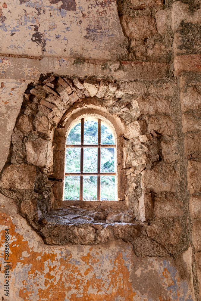old stone wall, Windows, doors, in an abandoned temple in Kotor, Montenegro, background