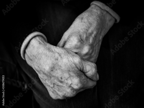 Foreground of hands of old woman