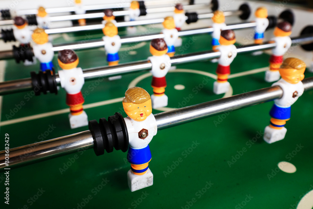 dolls of a retro foosball table to play table football dolls of a retro foosball table to play table football