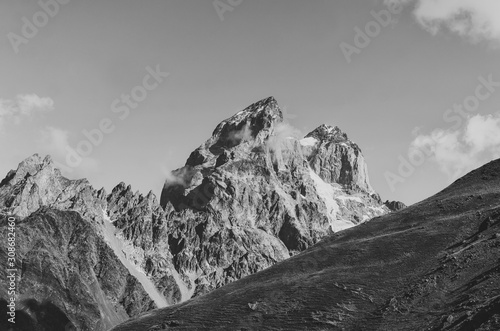 Black and white shot of Mount Ushba, Main Caucasian ridge. Zemo Svaneti, Georgia. Autumn landscape.