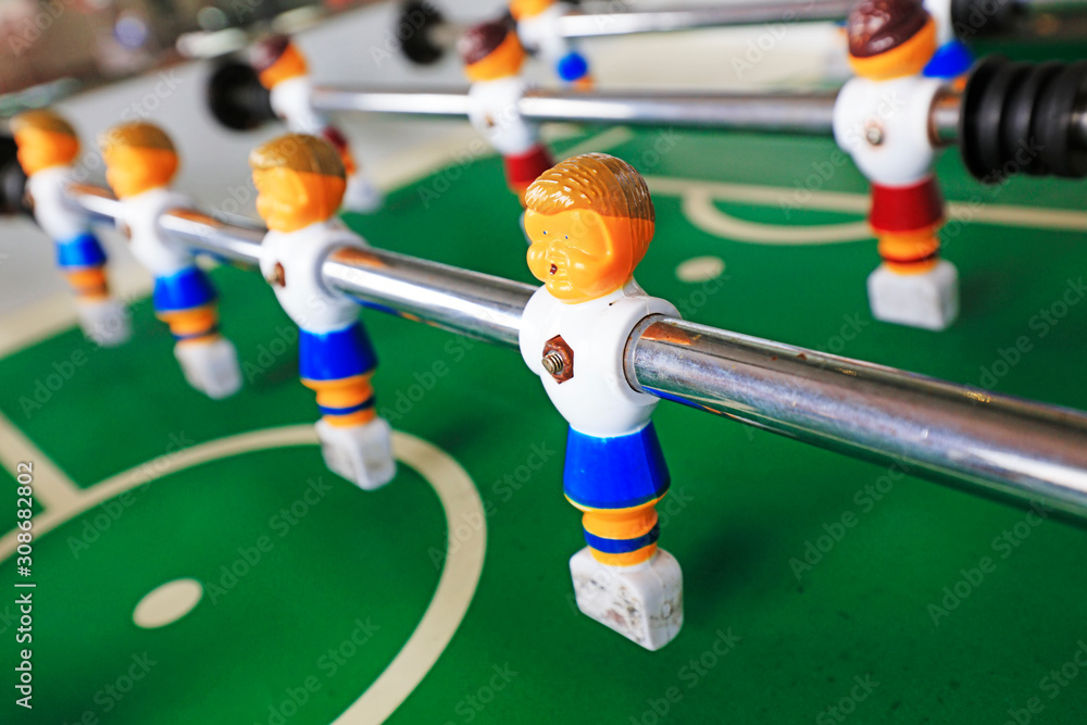 Fototapeta premium dolls of a retro foosball table to play table football