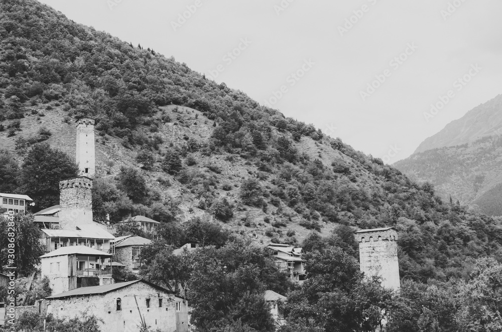 Black and white shot of Mountain village with towers. Mestia, Svaneti, Georgia