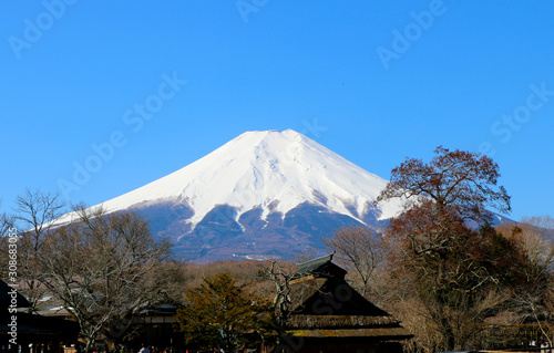 Fuji Mountain in Japan on top of the mountain is covered with snow all year and is a beautiful place with lots of people to visit