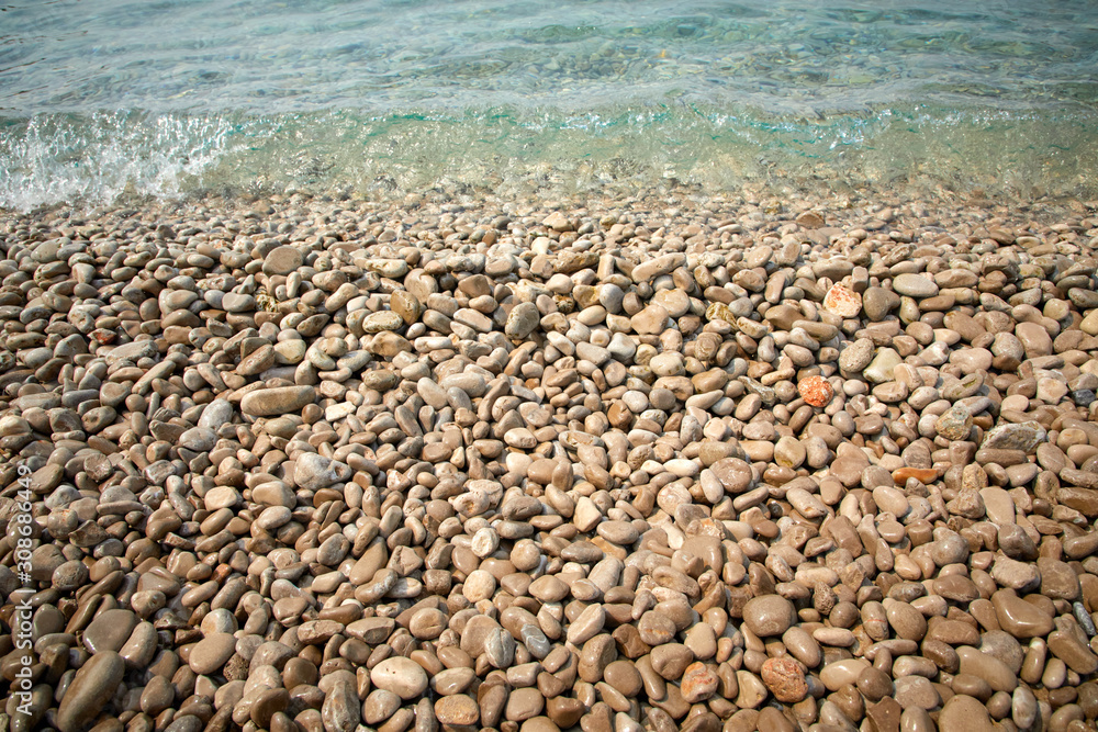pebbles on the beach in the Montenegro - obrazy, fototapety, plakaty 