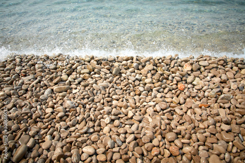 Photo pebbles on the beach in the Montenegro