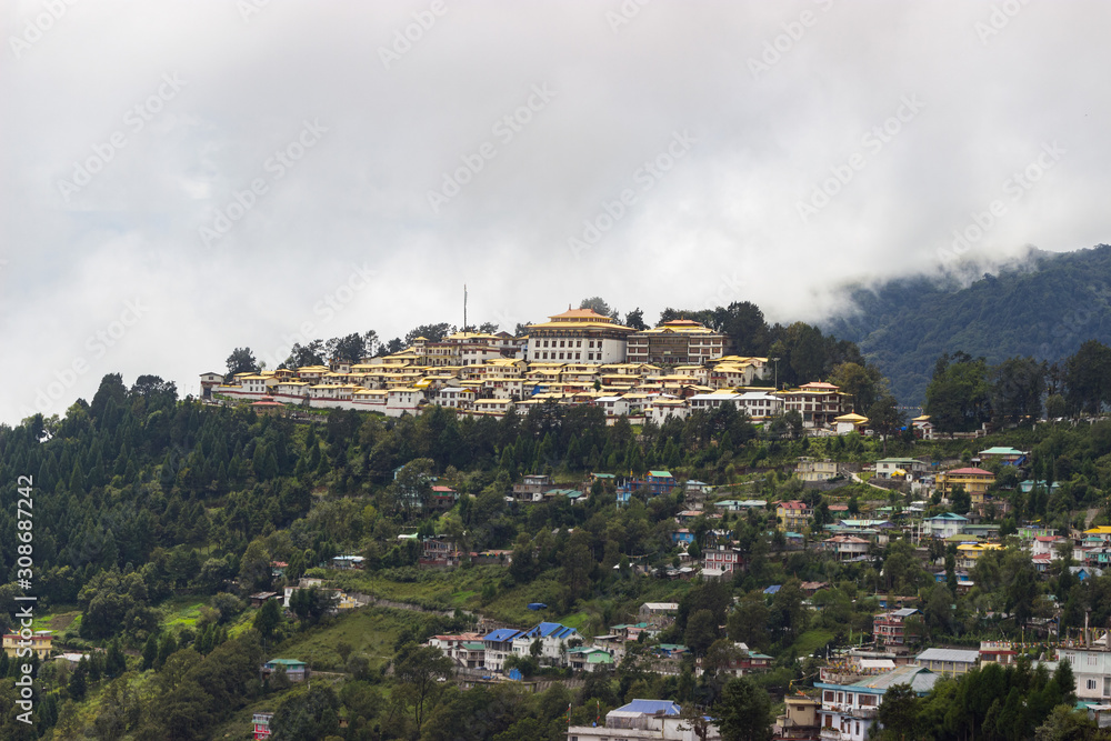 incredibly beautiful monastery of the city a tawang in the clouds, landscape in india