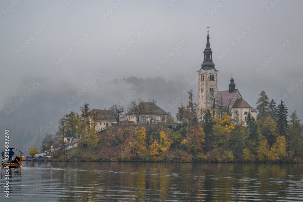 Island on a Bled Lake in Slovenia. Mysterious island in fog.