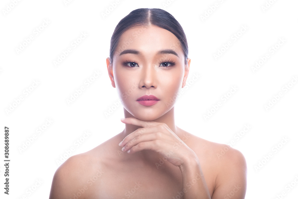 Beautiful Young Asian Woman with Clean Fresh Skin isolate on white background. Spa, Face care, Facial treatment, Beauty and Cosmetics concept. Left hand touch chin.