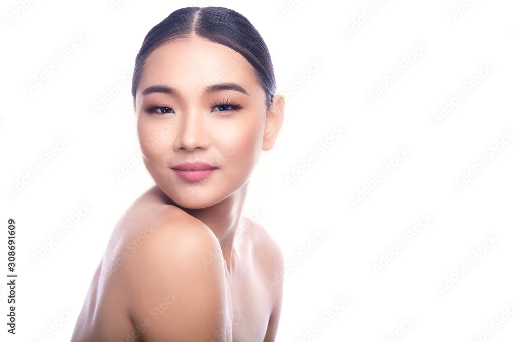 Beautiful Young Asian Woman with Clean Fresh Skin isolate on white background. Spa, Face care, Facial treatment, Beauty and Cosmetics concept. Chin on right shoulder, smile.