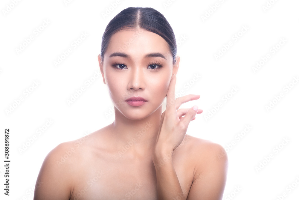 Beautiful Young Asian Woman with Clean Fresh Skin isolate on white background. Spa, Face care, Facial treatment, Beauty and Cosmetics concept. Finger on jaw.