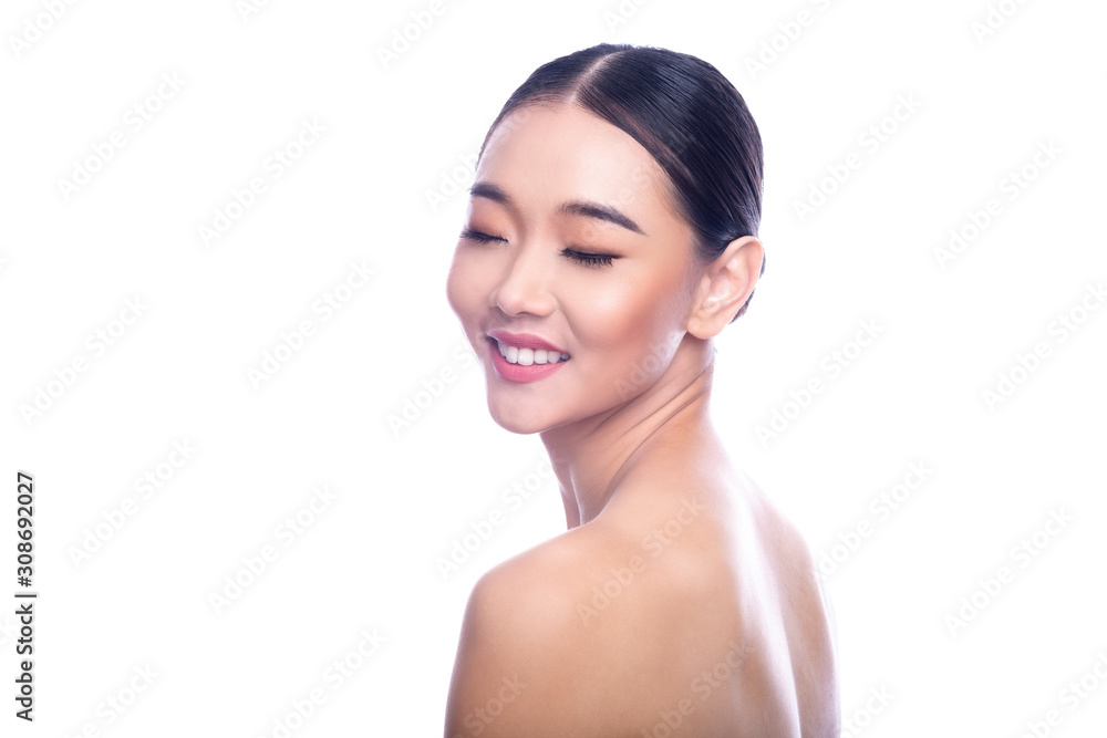 Beautiful Young Asian Woman with Clean Fresh Skin isolate on white background. Spa, Face care, Facial treatment, Beauty and Cosmetics concept. Look from behind, eye close, big smile. Beautiful Young Asian Woman with Clean Fresh Skin isolate on white background. Spa, Face care, Facial treatment, Beauty and Cosmetics concept. Look from behind, eye close, big smile.