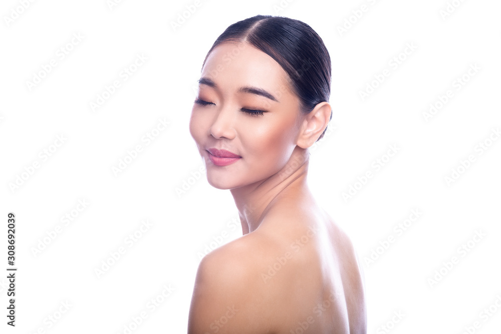 Beautiful Young Asian Woman with Clean Fresh Skin isolate on white background. Spa, Face care, Facial treatment, Beauty and Cosmetics concept. Look from behind, eye close, smile. Beautiful Young Asian Woman with Clean Fresh Skin isolate on white background. Spa, Face care, Facial treatment, Beauty and Cosmetics concept. Look from behind, eye close, smile.
