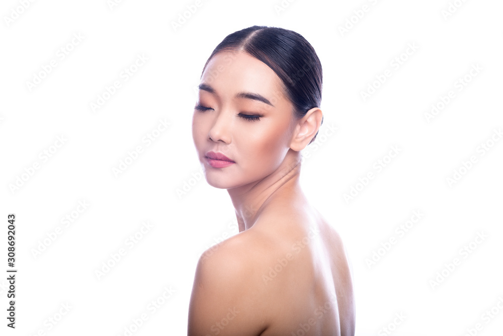 Beautiful Young Asian Woman with Clean Fresh Skin isolate on white background. Spa, Face care, Facial treatment, Beauty and Cosmetics concept. Look from behind, eye close. Beautiful Young Asian Woman with Clean Fresh Skin isolate on white background. Spa, Face care, Facial treatment, Beauty and Cosmetics concept. Look from behind, eye close.