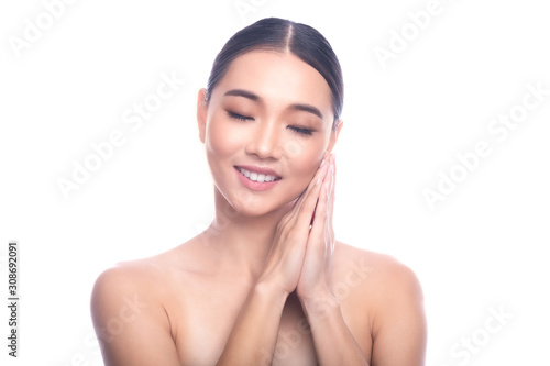 Beautiful Young Asian Woman with Clean Fresh Skin isolate on white background. Spa, Face care, Facial treatment, Beauty and Cosmetics concept. Sleeping beauty, eye close, big smile.