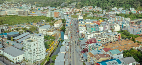 Cars and Bikes traffic in Patong city  Thailand Phuket Island 4K Drone flight