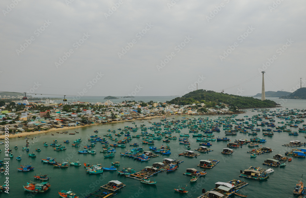 Fishing boats and fisherman houses on the water in Vietnam Phu Quoc Island