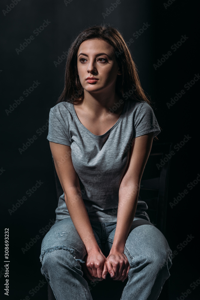 depressed girl looking away while thinking about suicide isolated on black depressed girl looking away while thinking about suicide isolated on black