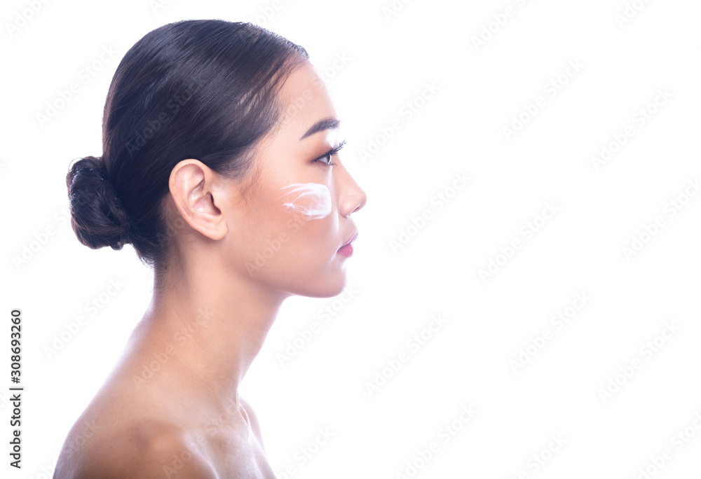 Beautiful Young Asian Woman with Clean Fresh Skin isolate on white background. Spa, Face care, Facial treatment, Beauty and Cosmetics concept. Side shot. Beautiful Young Asian Woman with Clean Fresh Skin isolate on white background. Spa, Face care, Facial treatment, Beauty and Cosmetics concept. Side shot.