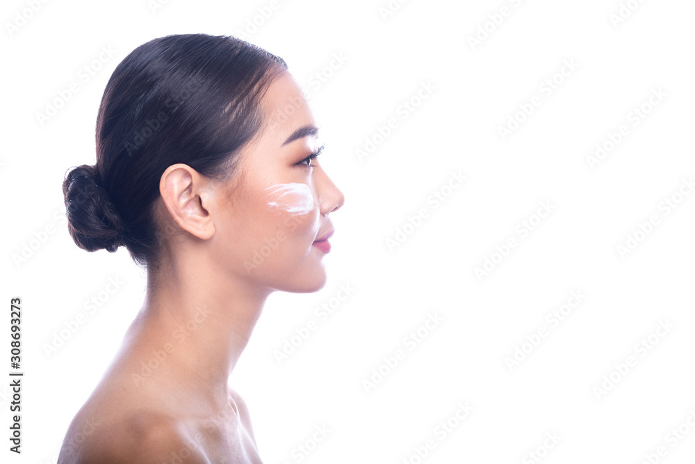 Beautiful Young Asian Woman with Clean Fresh Skin isolate on white background. Spa, Face care, Facial treatment, Beauty and Cosmetics concept. Side shot, smile. Beautiful Young Asian Woman with Clean Fresh Skin isolate on white background. Spa, Face care, Facial treatment, Beauty and Cosmetics concept. Side shot, smile.