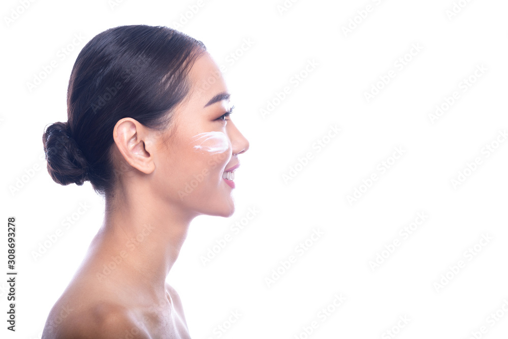 Beautiful Young Asian Woman with Clean Fresh Skin isolate on white background. Spa, Face care, Facial treatment, Beauty and Cosmetics concept. Side shot, big smile. Beautiful Young Asian Woman with Clean Fresh Skin isolate on white background. Spa, Face care, Facial treatment, Beauty and Cosmetics concept. Side shot, big smile.