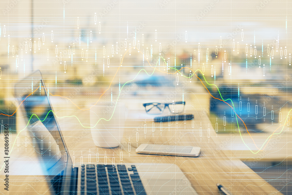 Obraz premium Financial market graph hologram and personal computer on background. Double exposure. Concept of forex.