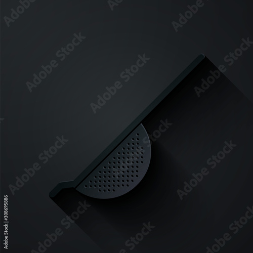 Paper cut Kitchen colander icon isolated on black background. Cooking utensil. Cutlery sign. Paper art style. Vector Illustration