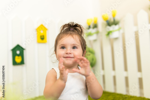 Portrait portrait of a cute little girl playing
