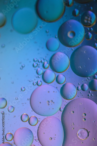 Oil drops in water. Abstract psychedelic pattern image multicolored. Abstract background with colorful gradient colors. Dof.