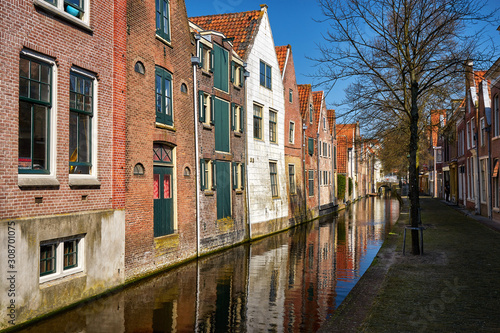 Traditional dutch brick houses at the Alkmaar canal