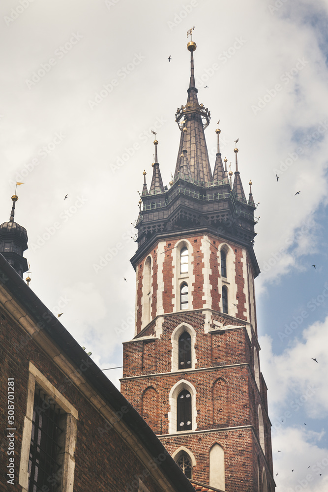 Backside view of Saint Mary's Basilica, Brick Gothic church adjacent to the Main Market Square in Krakow, Poland from below