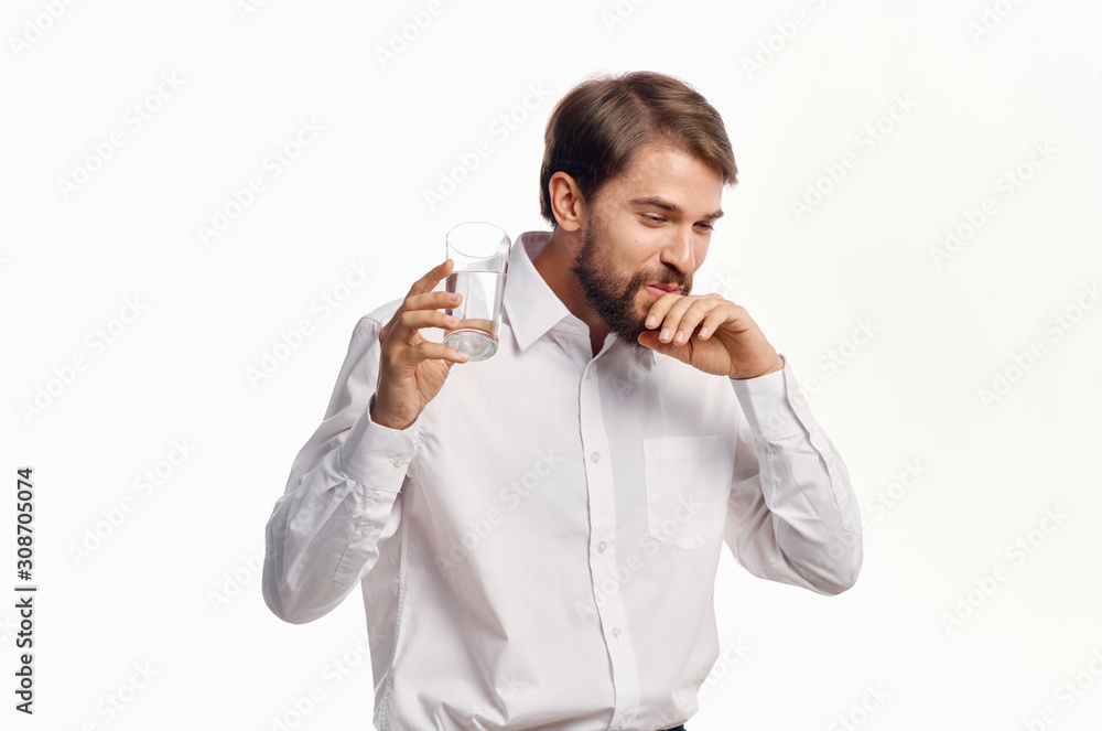 portrait of young man with glass of red wine