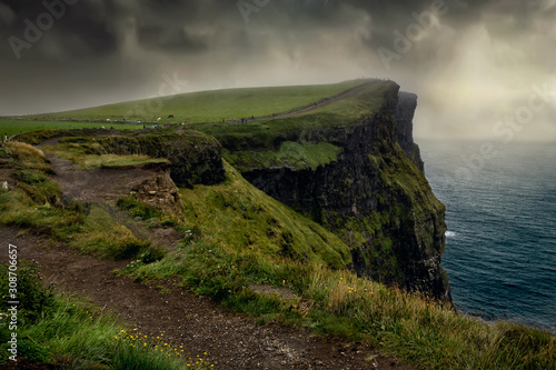 Epic view of of famous Cliffs of Moher and wild Atlantic Ocean, County Clare, Ireland.