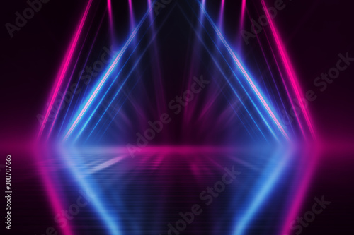 Empty dark abstract background. Background of empty show scene. Glow of neon lights on an empty concert venue. Reflection of light on the pavement.