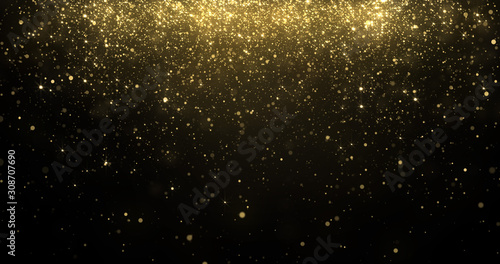Gold glitter confetti particles falling, golden sparkling light shine background for Christmas holiday. Abstract magic golden glowing shimmer confetti with firework glittering sparks photo