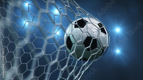 Soccer ball flew into the goal. Soccer ball bends the net  against the background of flashes of light. Soccer ball in goal net on blue background. A moment of delight. 3D illustration