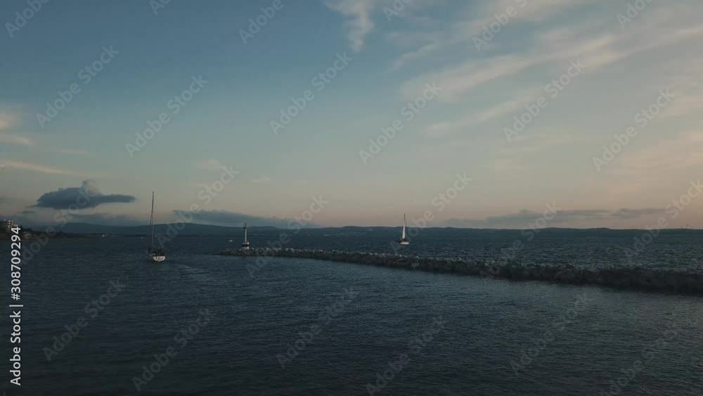 Tourist Sailboats Cruising The Marina Of Thessaloniki, Greece On A Beautiful Afternoon - Aerial Shot Tourist Sailboats Cruising The Marina Of Thessaloniki, Greece On A Beautiful Afternoon - Aerial Shot