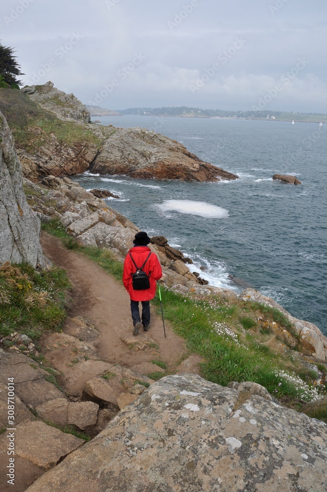 PORT MANECH, FRANCE 07 MAY, 2016: Hiker in Port Manech in Brittany