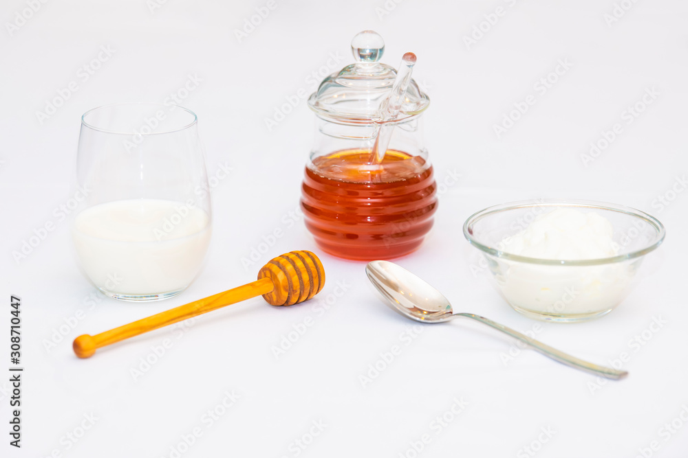 fresh milk and yoghurt with a jar of honey fresh milk and yoghurt with a jar of honey