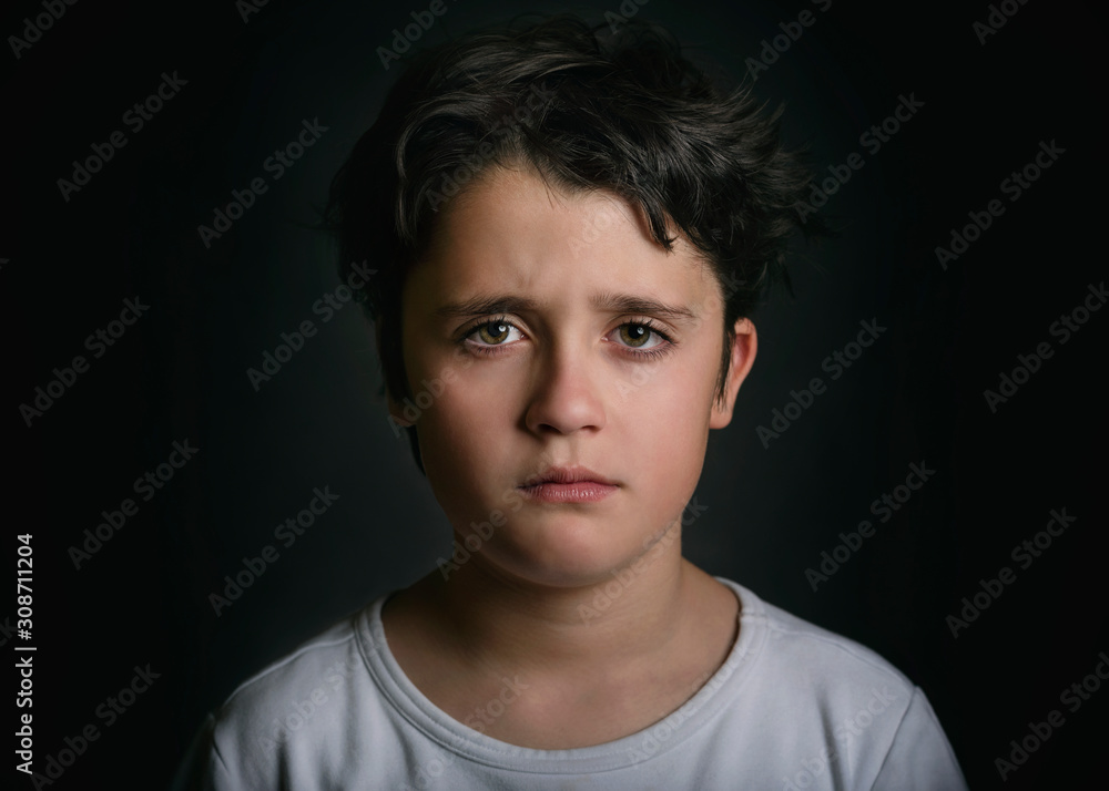 Fototapeta premium Portrait of sad child