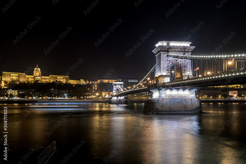 Night view of the Szechenyi Chain Bridge is a suspension bridge that spans the River Danube between Buda and Pest.