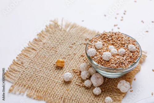 Til Gul OR Sweet Sesame Laddu for Indian festival Makar Sankranti over white background  photo