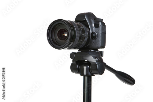 Camera on tripod isolated on white background