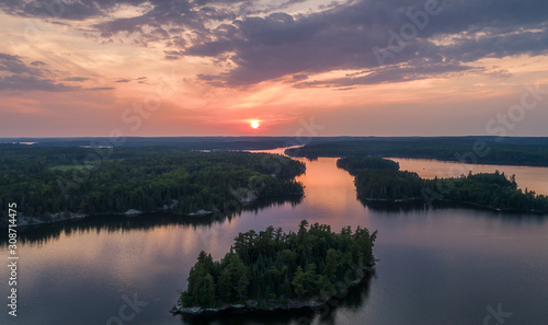 An aerial view of a lake in the boreal forest of Northwest Ontario, Canada.